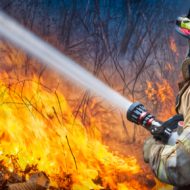 Natural,Disaster,,firefighters,Spray,Water,To,Wildfire.